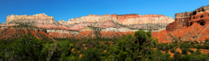 Panoramic view of colorful cliffs and desert landscape along the Burr Trail in southern Utah.