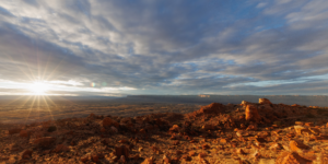Sunset over Marble Canyon with glowing red rocks and dramatic clouds, Arizona landscape photography